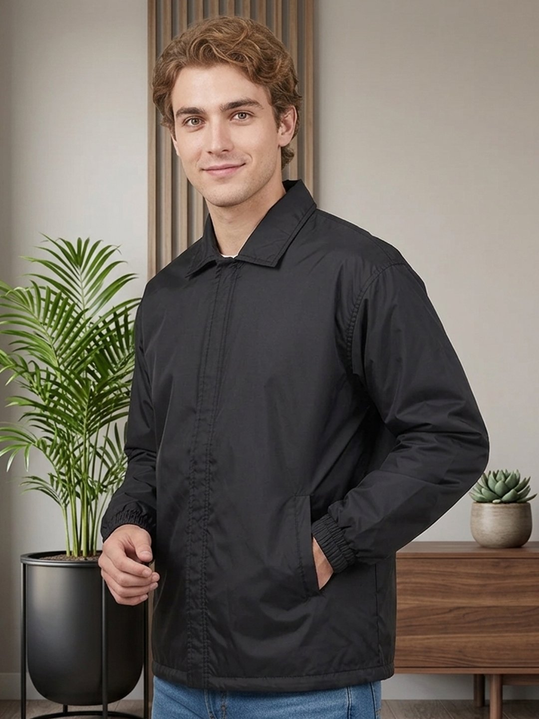 Men’s zip-up winter jacket featuring a structured collar, elastic cuffs, side pockets, and clean contemporary styling for daily wear.