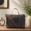 Laptop shoulder bag with sturdy handles, adjustable strap and spacious compartments, ideal for office, travel and everyday use.