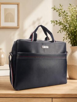 Stylish multipurpose bag with top handles and adjustable shoulder strap, designed for convenient carrying during travel, work and daily use.