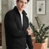 Modern men's jacket featuring a full front zip, stand collar, ribbed cuffs, side pockets, and relaxed casual styling.