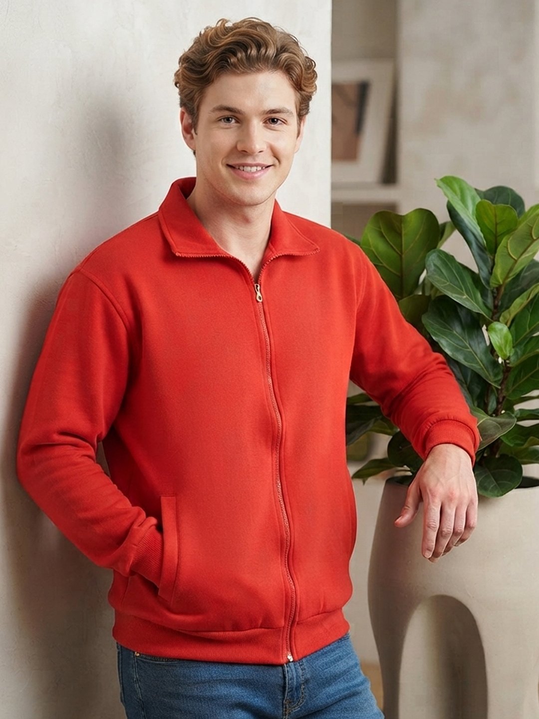 Modern men's jacket featuring a full front zip, stand collar, ribbed cuffs, side pockets, and relaxed casual styling.
