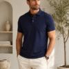 Richard Paadler 33 Indigo Melange Men's regular fit polo featuring classic construction and stylish details for effortless daily wear.
