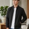 Men’s zip-up winter jacket featuring a structured collar, elastic cuffs, side pockets, and clean contemporary styling for daily wear.