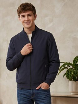 Men’s zip-up winter jacket featuring a structured collar, elastic cuffs, side pockets, and clean contemporary styling for daily wear.