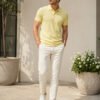 Stylish men's polo crafted with premium knit fabric and elegant contrast trim detailing.