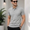 Stylish men's polo crafted with premium knit fabric and elegant contrast trim detailing.