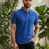 Stylish men's polo crafted with premium knit fabric and elegant contrast trim detailing.