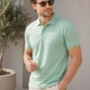 Premium knit polo T-shirt featuring sophisticated collar design and durable everyday wear performance.