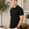 Premium knit polo T-shirt featuring sophisticated collar design and durable everyday wear performance.