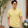 Premium knit polo T-shirt featuring sophisticated collar design and durable everyday wear performance.