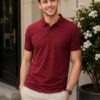 Premium knit polo T-shirt featuring sophisticated collar design and durable everyday wear performance.