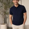 Premium knit polo T-shirt featuring sophisticated collar design and durable everyday wear performance.