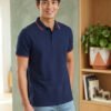 Premium men's polo T-shirt featuring classic collar design with refined contrast tipping for everyday elegance.