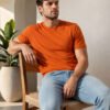 Modern casual tee featuring a comfortable fit, short sleeves and round neckline for effortless everyday outfit styling.