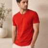 Modern casual tee featuring a comfortable fit, short sleeves and round neckline for effortless everyday outfit styling.