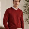 Oswal Wool Mahroon Men's black wool sweater layered over a white collared shirt for stylish winter wear.