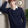 Oswal Wool Navy-Blue Men's black wool sweater layered over a white collared shirt for stylish winter wear.