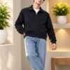 Cosmic Blue Umber Jacket 1 Men’s casual zip-up jacket with a structured collar, paired with patterned jeans for a modern everyday look.